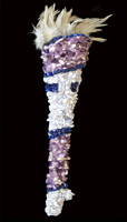 Rhadalognatus: 
						(Skull) resin replica of a Rhadalognatus boweni; an amphibian of the Triassic period. (Feathers) Mallard. The piece is covered with tumbled and polished Amethyst, Blue Lace Agate and Lapis Lazuli 
						stones (Size) Approximately 17 x 4 inches.